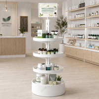 Présentoir rotatif à 4 niveaux en acier laminé à froid blanc, autoportant, pour produits de santé et pharmacies