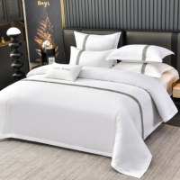Ensemble de literie de luxe avec sangles brodées, 4 pièces, housse de couette blanche pure pour hôtel 5 étoiles, vente en gros