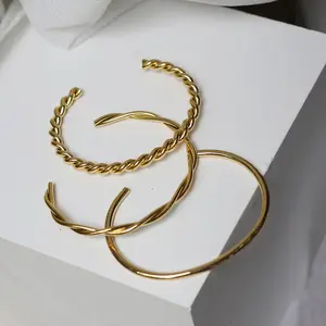 Pulsera de acero inoxidable con alambre trenzado expandible para mujer, brazalete de joyería minimalista chapado en oro de 18k, venta al por mayor
