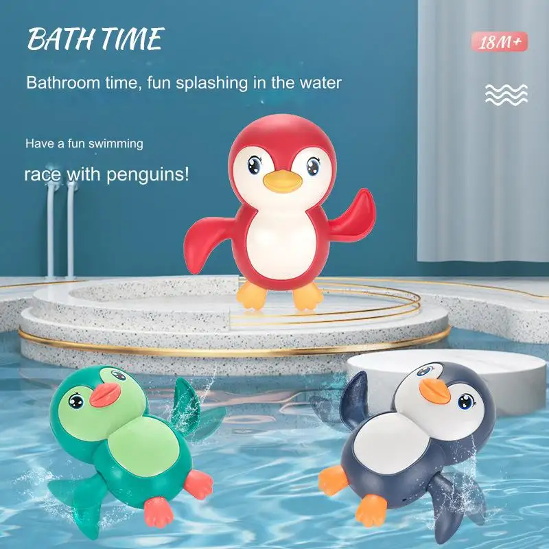 बच्चे पेंगुइन कार्टून आकार बेबी बाथ बाथरूम प्ले पहेली क्लॉकवर्क खिलौने थोक में छींटे करते हैं