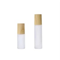 Vente en gros de 1ml couvercle en grain de bois 2ml rouleau en verre transparent dépoli pour bouteille à billes 5ml d'huile 10ml bouteille fendue avec rouleau sur l'étanchéité