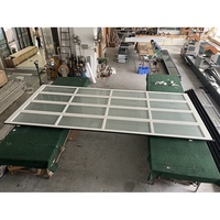 Dernier alliage d'aluminium + verre segmenté automatique porte de garage prix d'usine et moteur 2022