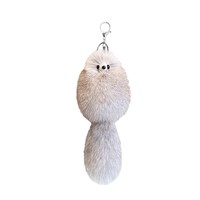 Porte-clés queue de renard véritable mignon avec nœud papillon, pendentif animal doux et moelleux pour la décoration de sacs et accessoires féminins