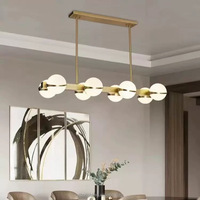 Lustres modernes de luxe léger pour salons, escaliers, salles à manger, hôtels. Lampes en cristal et en cuivre, fabrication sur mesure directe d'usine.