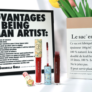 Emballage de <span class=keywords><strong>tube</strong></span> de gloss à lèvres personnalisé avec logo d'artiste, capuchon rond en papier unique, contenants pour gloss à lèvres, tubes à rouge à lèvres cosmétiques vides - Product Image 1