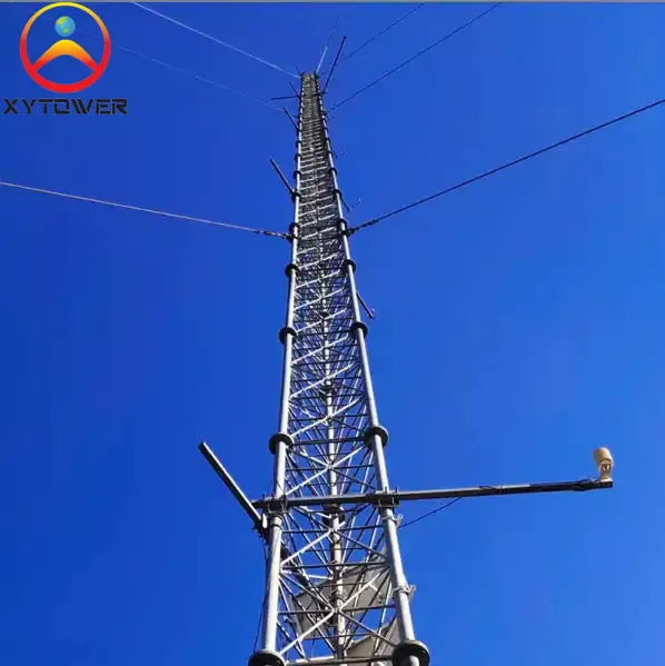 Sıcak daldırma galvanizli Guyed tel 3 bacaklı çelik boru kafes mikrodalga telekomünikasyon kulesi
