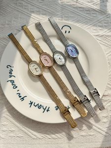 Bán nóng hình bầu dục phụ nữ xinh đẹp đồng hồ với dây đeo bằng thép không gỉ cho phụ nữ đơn giản ngọc trai quay số với kim cương tối giản Đồng hồ đeo tay - Product Image 4