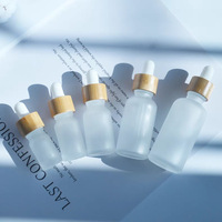 Grosir 10ml 15ml 20ml 30ml 50ml 100ml Serum Wajah kosong buram botol penitis bambu kaca minyak esensial