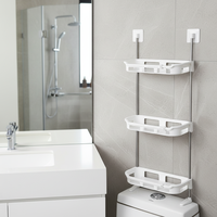 Porte-papier toilette mural en plastique avec étagère de rangement élégante à trois niveaux à ventouse au-dessus des toilettes
