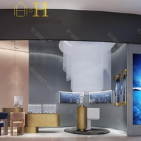 Vitrine de présentation de bijoux haut de gamme minimaliste et incurvée pour boutique de bijoux, comptoir de présentation de bijoux