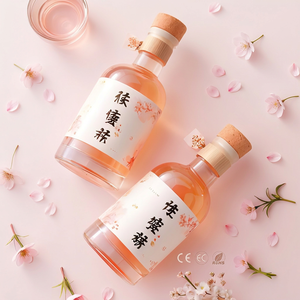 Vente en gros de bouteilles de vin rondes en verre transparent mat de 500 ml (16 oz) avec bouchon à vis en polymère pour le stockage de la vodka, des spiritueux et des liqueurs - Product Image 1