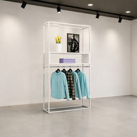 Porte-vêtements commercial autoportant en métal blanc avec étagères de rangement pour boutique