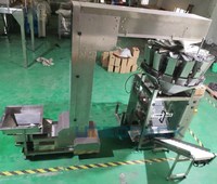 Machine d'emballage verticale à plusieurs têtes pour la viande, les particules, les aliments en vrac, les épices et les graines, avec limite de hauteur, emballage en film papier