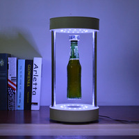 Présentoir de bouteilles à lévitation magnétique et rotatif avec lumière LED