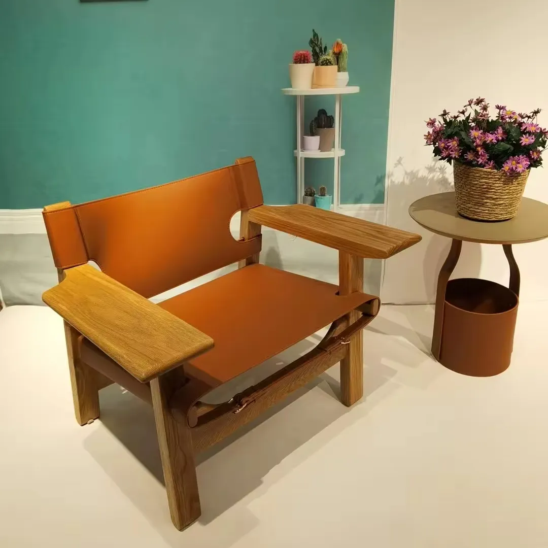 Poltrona moderna in pelle da sella design danese poltrona da salotto in pelle di quercia e rattan, sedia spagnola Vintage