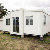 Maison préfabriquée mobile à structure en acier extensible avec panneaux sandwich, design moderne de 20 pieds pour magasin et usage extérieur