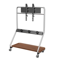 Chariot rotatif réglable en acier inoxydable pour téléviseur au sol Support pour téléviseur à DEL avec prise de courant et panneau perforé