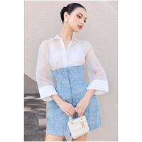 Fournisseur de vêtements du Vietnam ODM Enzo Leo Jupe Icebreaker pour femme, longueur ras du sol, design asymétrique, polyester/coton écologique