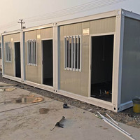 Maisons conteneurs portables blanches à prix raisonnable, très demandées, avec escalier, chaudes et résistantes au vent, pour la vente directe