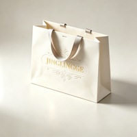 Sacs en papier kraft personnalisés pour le commerce de détail, sacs cadeaux pour vêtements, sacs d'emballage miniatures de luxe avec poignée, sacs en papier imprimés avec logos