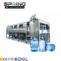 Ligne de production automatique d'eau pure minérale en bouteilles de 18 litres, 150-2000 BPH, machine de remplissage