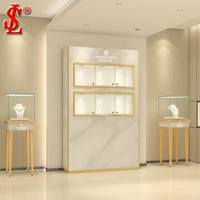 Aménagement intérieur de boutique de bijoux de luxe, vitrine murale avec éclairage LED, mobilier de magasin moderne, solution complète pour l'aménagement de boutiques