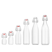 Botol Susu Kaca Bulat Kapasitas 100ml 200ml 500ml 700ml 1000ml dengan Tutup Flip-top dan Pengikat Besi, Kemasan Kotak untuk Minuman Beralkohol