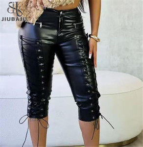 Nouveau pantalon moulant sexy en similicuir patchwork pour femme, couleur unie avec fermeture éclair et bandage - Product Image 1