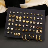 À la mode perle papillon et marguerite Tai Chi mode boucles d'oreilles luxe plaqué or Zircon pierres pour les femmes âgées doux Cool en gros