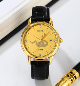 นาฬิกา SKMEI 2327 รุ่นหรูหรา สายหนังสีทอง ขนาด 18 มม. ลายการ์ตูนงู 12 นักษัตรจีน ผลิตตามสั่ง OEM - Product Image 1