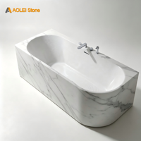 Baignoire autoportante en marbre blanc poli de luxe avec silhouette incurvée pour la décoration de salle de bain de villa moderne