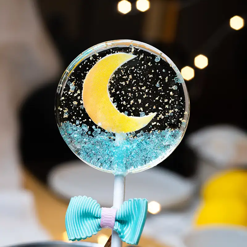 High quality 30g new design cute moon handmade lollipop hard candy for wedding candy
