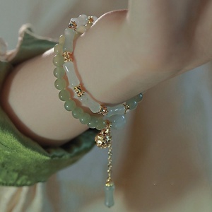 สร้อยข้อมือ "ยุนชุย บาลาด" สไตล์จีนใหม่สำหรับผู้หญิง หยกเฮเทียนย้อนยุค ประดับด้วยหยกไหมทองคุณภาพสูงรูปฟักทอง - Product Image 1