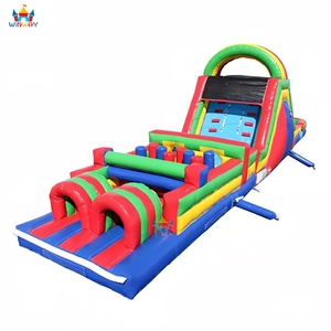 Circuito de Obstáculos Inflable con Temática de Arcoíris, Doble Carril, Casa de Brinco Funfest para Alquiler en Fiestas - Product Image 1