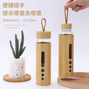 Bouteille d'eau en verre borosilicate avec coque en bambou et sangle, portable, simple paroi, résistante aux hautes températures, pour usage domestique et extérieur - Product Image 1