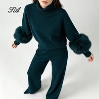 Tyan 2026 – Nouvelle collection automne-hiver : Pull en cachemire tricoté avec poignets en fourrure de renard véritable, couleur sarcelle, et pantalon long épais et chaud pour femme