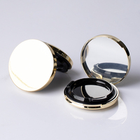 Le tout nouveau fond de teint en plastique vide remplaçable de haute qualité rond noir doré avec miroir