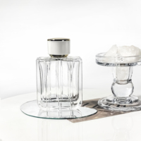 Bouteille en verre de forme unique de haute qualité, bouteille d'huile essentielle de 100 ml, flacons de parfum transparents, atomiseur, flacons pulvérisateurs