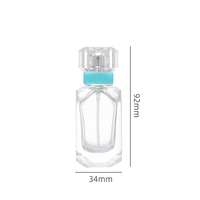 Vente en gros Bouteille de parfum vide de luxe de 30ml 50ml Design unique carré en verre avec pulvérisateur à pompe Emballage en boîte personnalisé transparent