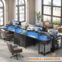Nouvelle table d'angle pour jeux sur ordinateur à double face en forme de L avec support pour moniteur, bande LED et prise de courant USB