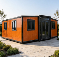 Casa Contenedor Expandible con Acabado en Madera Naranja, Estructura Negra, Paneles Aislantes, Ventanas de Doble Cristal, Casa Prefabricada Modular Tipo Estudio
