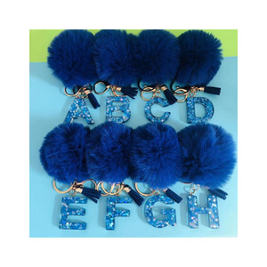 Hot-selling Fashion Decoration Pompom Keychains Custom 26 Letter <strong>and</strong> Puff Ball Acrylic <strong>Keychain</strong> - Product Image 1
