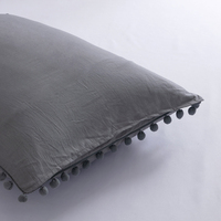 Taie d'oreiller minimaliste et mignonne à pompons, 100 % polyester, couleur unie, douce et légère, pour la maison, l'hôpital, l'hôtel