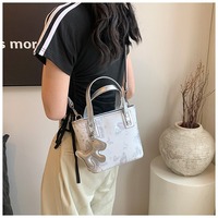 Sacs en PU populaires pour femmes pour l'été, sacs à bandoulière et sacs fourre-tout polyvalents, sacs seau tendance 2024, sacs portables