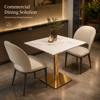 Ensemble de table à manger en marbre de luxe moderne avec base dorée et chaises rembourrées pour hôtel, restaurant, café, salle à manger