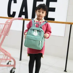 Mini bolso de viaje pequeño con logotipo personalizado para niños y niñas, mochila de diseñador para exteriores