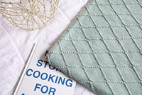 Plaid tricoté Aodu avec franges, texture bouclée et motif losanges, confortable pour canapé, lit et salon, vente en gros directe usine