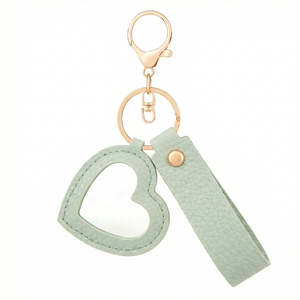 Espejo Compacto de Cuero PU con Forma de Corazón y Diseño de Litchi, Llavero con Espejo de Viaje Plegable Giratorio de Doble Cara - Product Image 5