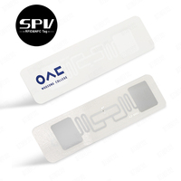 Étiquettes adhésives en papier intelligent d'autocollant de puce RFID UHF imprimables de code à barres de prix bas pour la gestion d'entrepôt de logistique de livre de bibliothèque