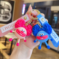 E-Perm-Frisur Monster-Gummi-Schlüsselanhänger Lustige Puppe Auto-Schlüsselanhänger Taschenanhänger Hergestellt in Guangdong Modell 236489